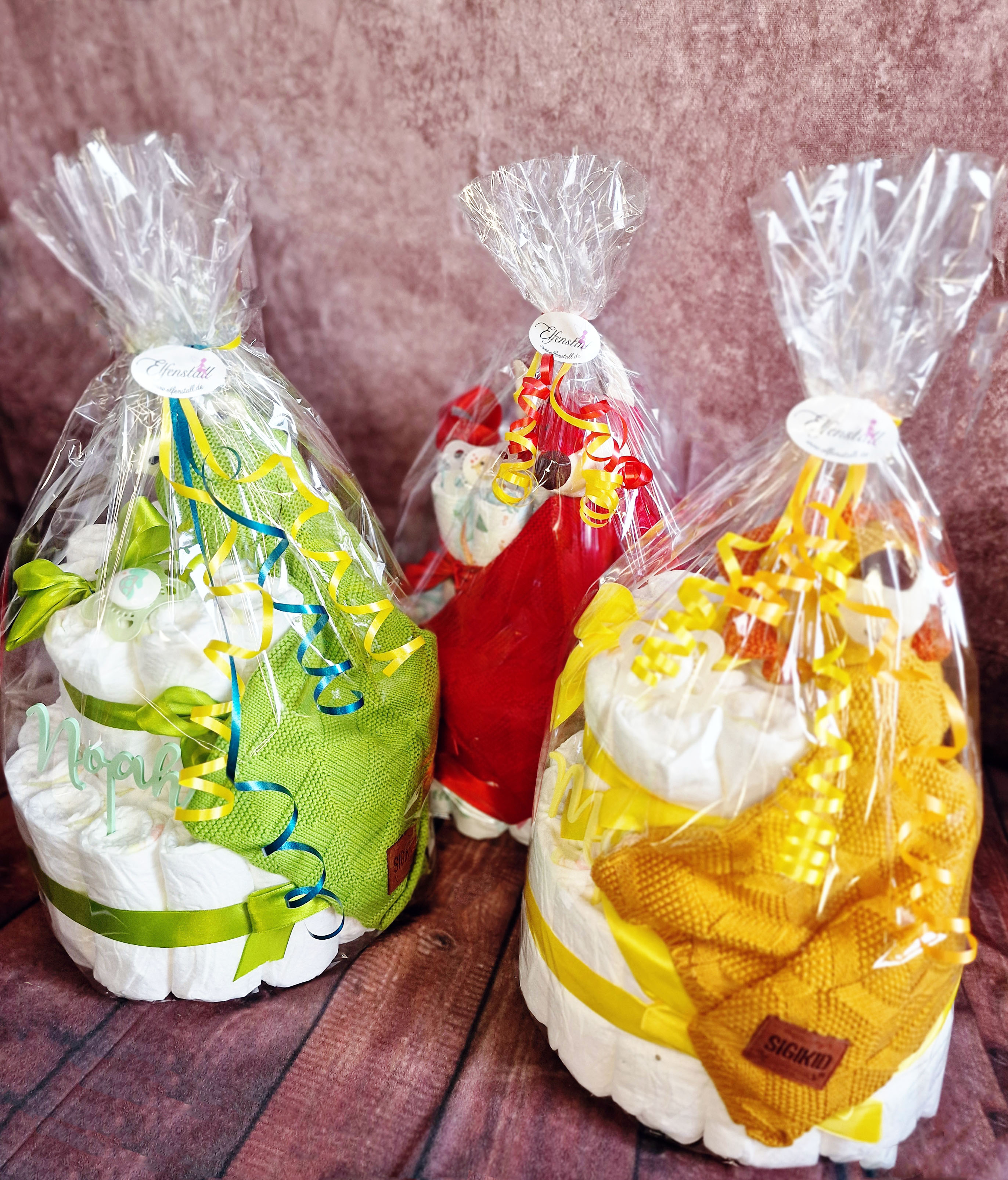 Elfenstall Windeltorte Pamperstorte mit Sigikid Strick Schnuffeltuch Löwe Orange Elfenstall Windeltorte Pamperstorte mit Sigikid Strick Schnuffeltuch Löwe Orange